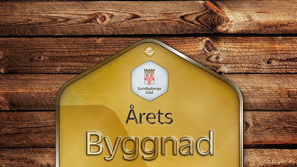 Plakett med texten Årets byggnad på trävägg. Illustration. 